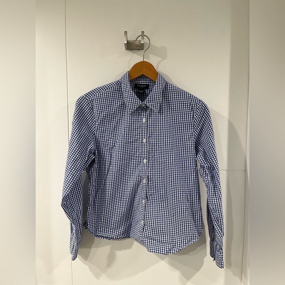 Limited stretch material long-sleeve button-down, size large, gently used.